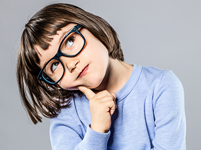 Girl with glasses thinking
