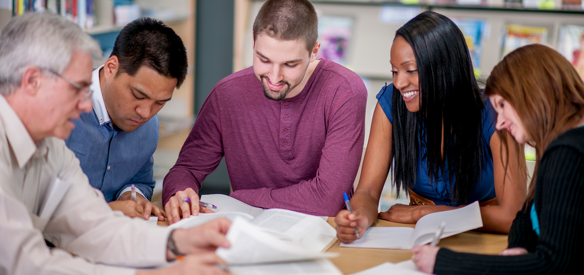 group of adults working together